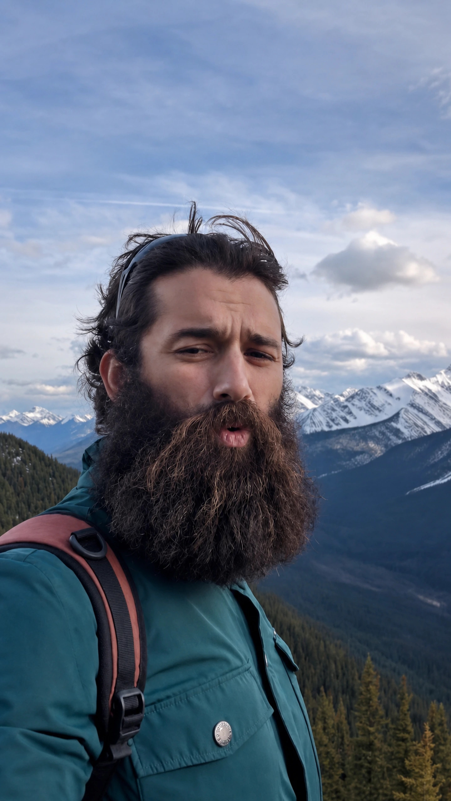 Joe Brooker outdoors in the mountains